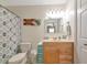 Bathroom featuring beach decor and a shower tub with a shower curtain at 6511 Georgia Ave, Bradenton, FL 34207