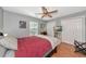 Comfortable bedroom with hardwood floors, ceiling fan and natural light at 6511 Georgia Ave, Bradenton, FL 34207
