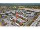 Aerial view of Crosswinds Colony Condominiums featuring a central pool, well-maintained landscaping, and ample parking at 6800 20Th N Ave # 307, St Petersburg, FL 33710