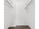 Walk-in closet with rods and shelves for ample storage and organization at 6800 20Th N Ave # 307, St Petersburg, FL 33710