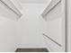 Walk-in closet with rods and shelves for ample storage and organization at 6800 20Th N Ave # 307, St Petersburg, FL 33710