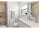 Updated bathroom featuring a white vanity, gold hardware, a large mirror, and a shower-tub combination at 722 61St S Ave, St Petersburg, FL 33705