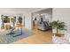 Open concept living space that offers sightlines from the living room to the office and updated kitchen at 722 61St S Ave, St Petersburg, FL 33705