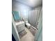 Full bathroom featuring tile shower, vanity and patterned tile flooring at 8050 Roxburgh Ct, Weeki Wachee, FL 34613