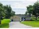 Charming single-story home with a well-maintained lawn and an attached garage at 8050 Roxburgh Ct, Weeki Wachee, FL 34613