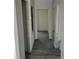 Unfinished hallway with wood-look flooring running throughout at 8149 Cashew, Webster, FL 33597