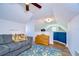 Finished attic bonus room featuring a comfortable seating area at 9304 Lake Chase Island Way, Tampa, FL 33626