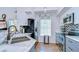 Modern kitchen with stainless steel appliances, white cabinets, and stylish backsplash at 9304 Lake Chase Island Way, Tampa, FL 33626
