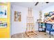 Bright studio space with an art easel and storage at 9304 Lake Chase Island Way, Tampa, FL 33626