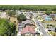 Overview of a neighborhood featuring pools, green spaces, and neatly arranged houses at 9730 Reynosa Dr, New Port Richey, FL 34655