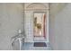 Inviting entryway with tile flooring and a glass block window at 9730 Reynosa Dr, New Port Richey, FL 34655