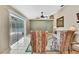 View of the living room showing sliding glass doors to the pool area at 9730 Reynosa Dr, New Port Richey, FL 34655