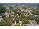 Aerial view of the neighborhood showcasing the verdant trees and well-spaced homes at 11470 Mahopac Rd, Weeki Wachee, FL 34614
