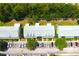 Aerial view of townhomes with mature landscaping and ample parking at 11622 Declaration Dr, Tampa, FL 33635