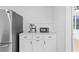 Contemporary kitchen with stainless steel refrigerator, microwave, and coffee maker at 1225 58Th N St # 204A, St Petersburg, FL 33710
