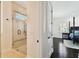 Bathroom with a glass enclosed shower, tile surround and access to the bedroom at 134 Chesapeake Ave, Tampa, FL 33606