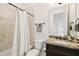 Well-maintained bathroom with granite vanity, a shower-tub combo, and neutral color scheme at 134 Chesapeake Ave, Tampa, FL 33606