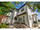 Exterior view of the home highlighting the multiple windows and a tile roof at 134 Chesapeake Ave, Tampa, FL 33606