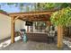 Outdoor gazebo with comfortable seating, an outdoor television and a ceiling fan at 134 Chesapeake Ave, Tampa, FL 33606