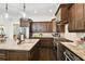 Well-equipped kitchen with stainless appliances and a granite-topped island with ample counter space at 134 Chesapeake Ave, Tampa, FL 33606