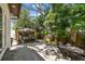 Backyard patio featuring a gazebo with outdoor furniture and landscaped garden at 134 Chesapeake Ave, Tampa, FL 33606