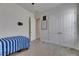 Bedroom showcasing a closet and ensuite bathroom entry at 13539 Carryback Dr, Dade City, FL 33525