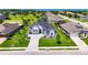 Beautifully landscaped home featuring a well-manicured lawn, elegant driveway, and charming curb appeal in a lovely neighborhood at 13539 Carryback Dr, Dade City, FL 33525