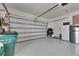Large garage with fridge at 13539 Carryback Dr, Dade City, FL 33525
