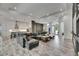 Expansive living area with open layout connecting to kitchen, dining, and foyer at 13539 Carryback Dr, Dade City, FL 33525