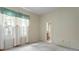 Bright bedroom featuring coordinated decor and ensuite bathroom at 15314 Sherwood Forest Dr, Tampa, FL 33647