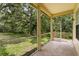 Enjoy backyard views from this screened-in porch, perfect for outdoor relaxation at 15314 Sherwood Forest Dr, Tampa, FL 33647
