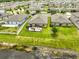 Charming single-Gathering home features a spacious backyard and scenic pond view at 15426 Wicked Strong St, Sun City Center, FL 33573