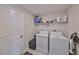 This laundry room features a washing machine and dryer at 15426 Wicked Strong St, Sun City Center, FL 33573