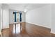Bedroom showcasing hardwood floors, ceiling fan, and bright window at 17812 Arbor Greene Dr, Tampa, FL 33647
