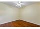 Bedroom with hardwood floors and ceiling fan at 17812 Arbor Greene Dr, Tampa, FL 33647
