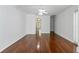 Bedroom featuring hardwood floors, ceiling fan, and outdoor access at 17812 Arbor Greene Dr, Tampa, FL 33647