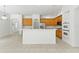 Spacious open-concept kitchen with island and modern appliances at 17812 Arbor Greene Dr, Tampa, FL 33647