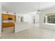 Spacious kitchen features a central island and ample cabinet space at 17812 Arbor Greene Dr, Tampa, FL 33647