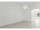 Bright room with decorative chandelier and tile flooring at 17812 Arbor Greene Dr, Tampa, FL 33647