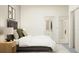 Comfortable bedroom featuring a plush bed, bedside tables with lamps, and artwork on the walls at 18465 Serene Lake Loop, Lutz, FL 33548