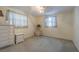 Comfortable bedroom with carpeting, natural light, and soft decor at 2039 Lyra Dr, Holiday, FL 34690