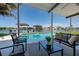 Beautiful backyard with a sparkling swimming pool and relaxing patio furniture, offering a great view at 263 87Th N Ave, St Petersburg, FL 33702