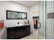 Stylish bathroom featuring modern vanity, updated fixtures, and a glass-enclosed shower for a spa-like experience at 263 87Th N Ave, St Petersburg, FL 33702