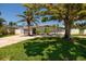 Charming home with lush front lawn and mature trees at 263 87Th N Ave, St Petersburg, FL 33702