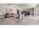 Open-concept living and dining area featuring modern décor, and an adjacent kitchen at 263 87Th N Ave, St Petersburg, FL 33702