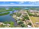Beautiful aerial view showcasing the home near several winding rivers at 2635 Manatee Harbor Dr, Ruskin, FL 33570