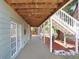 Long covered back porch with exterior access at 2635 Manatee Harbor Dr, Ruskin, FL 33570