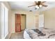 Light-filled bedroom featuring a closet and a ceiling fan at 2635 Manatee Harbor Dr, Ruskin, FL 33570