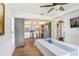 Open dining area adjacent to kitchen with wood flooring and ample natural light at 2635 Manatee Harbor Dr, Ruskin, FL 33570