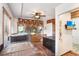 Bright grooming room with kennels, ceiling fan, and a TV for canine entertainment at 2635 Manatee Harbor Dr, Ruskin, FL 33570